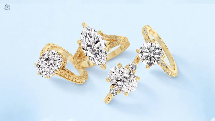 Four yellow gold diamond engagement rings with different centre stone shapes