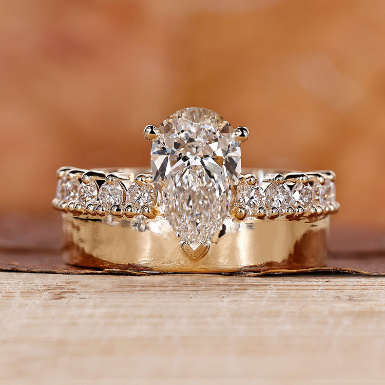 Pear Shaped Diamond Ring with a stunning prong setting.