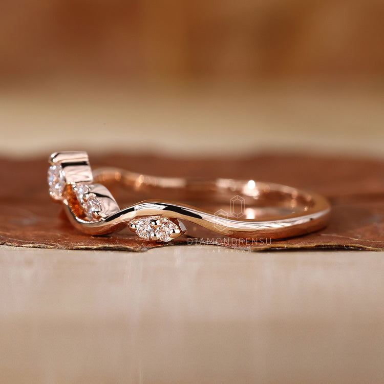 Tiara Wedding Band with intricate, elegant design details.