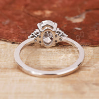 Muse Ring featuring a beautifully crafted oval diamond.