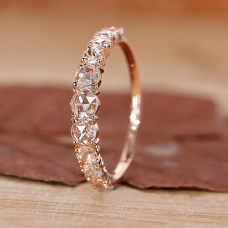 Shared Prong Wedding Band featuring brilliant round diamonds.