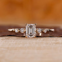 Four round prong setting diamond ring.
