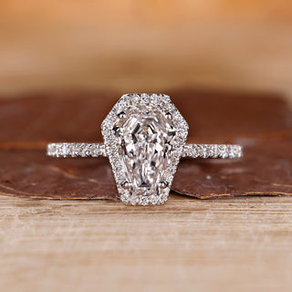 Coffin cut engagement ring with halo diamond ring.