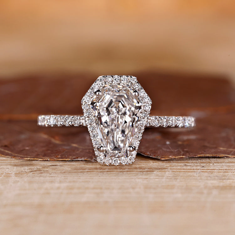 Coffin cut engagement ring with halo diamond ring.