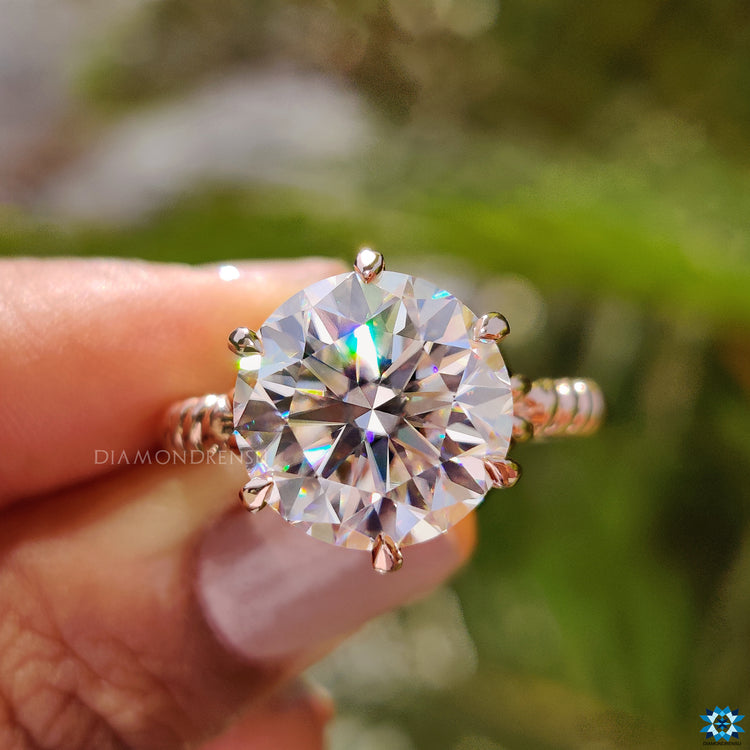 Round solitaire engagement ring with a timeless design.