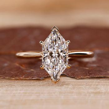 Dutch marquise engagement ring with tapered shank ring.