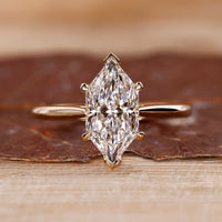 Dutch marquise engagement ring with tapered shank ring.