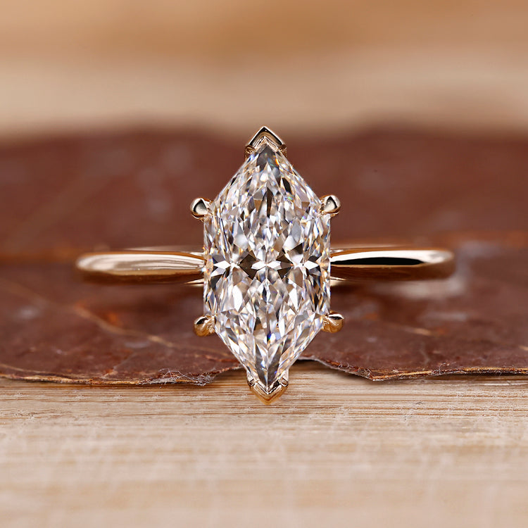 Dutch marquise engagement ring with tapered shank ring.