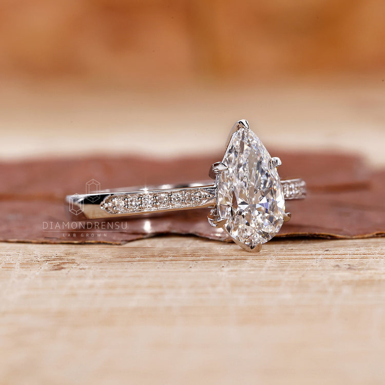 Tapered Pave Engagement Ring with delicate diamond detailing.