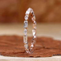 Elegant baguette and marquise eternity diamond ring