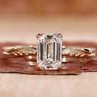 Three Stone Diamond Ring with brilliant center and side stones.