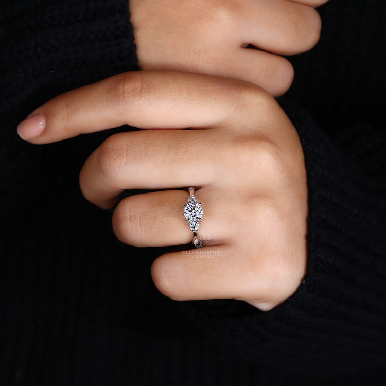 Nature-inspired round diamond engagement ring with IGI certified diamond and elegant split shank design