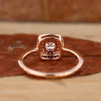 A detailed image of a loose round brilliant cut diamond, capturing its exquisite cut, clear facets, and exceptional sparkle against a dark, contrasting background.