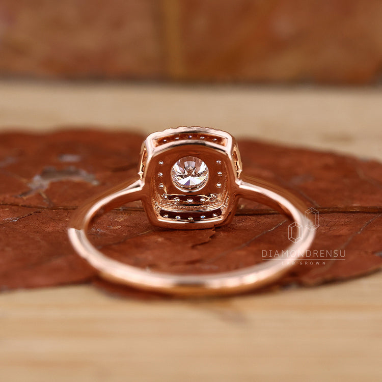 A detailed image of a loose round brilliant cut diamond, capturing its exquisite cut, clear facets, and exceptional sparkle against a dark, contrasting background.