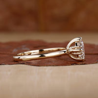 Triple prong ring showcasing a unique and secure diamond setting.