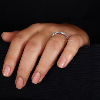 Diamond half eternity band showcasing intricate craftsmanship.