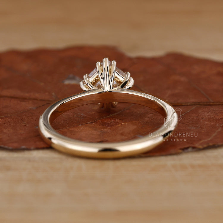 Elegant yellow gold engagement ring perfect for any proposal.