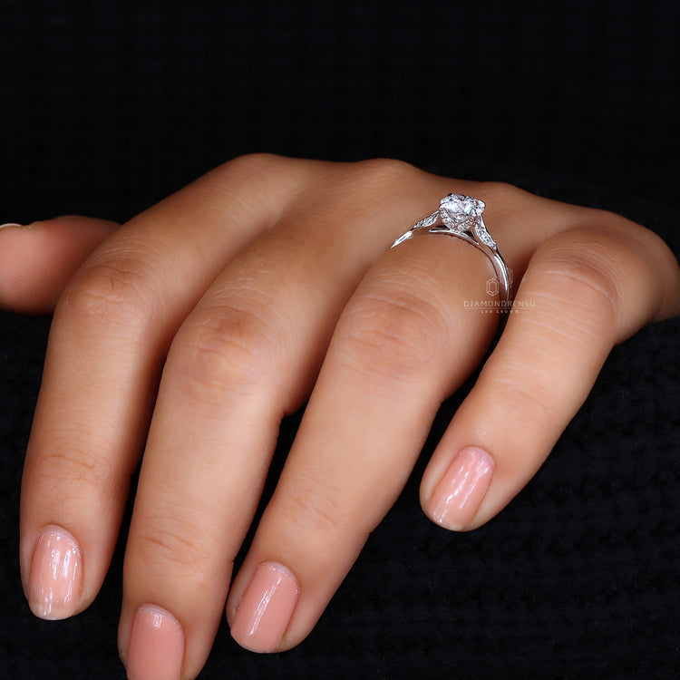 Handmade nature-inspired wedding ring by Diamondrensu, featuring a round diamond and claw prongs