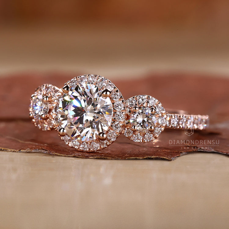 3 Stone Halo style engagement ring with timeless beauty.