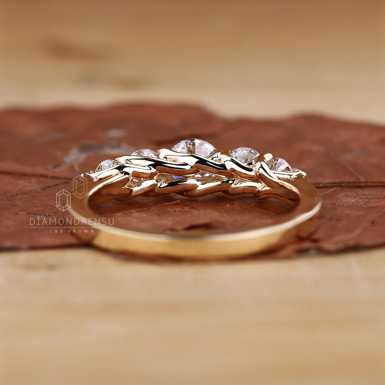 Yellow gold wedding band with handmade artistry.