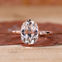 Cushion Cut Engagement Ring with a stunning diamond setting.