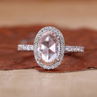 Oval Diamond Engagement Ring with a classic setting.