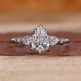 Pear diamond ring in white gold band.