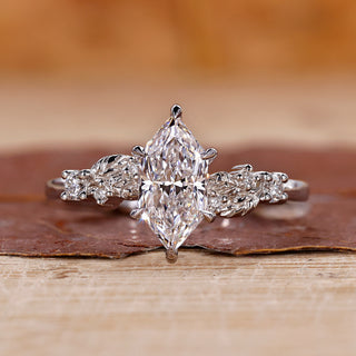 Dutch marquise ring muse ring side stone engagement ring