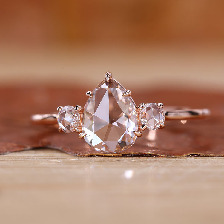 Pear Three Stone Engagement Ring featuring Lab Grown Diamond.