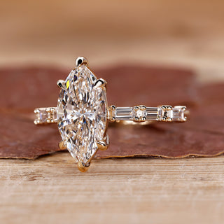 Marquise Cut Diamond Ring with pave baguette diamonds.