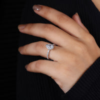 Pave diamond band highlighting a lab-grown diamond centrepiece.