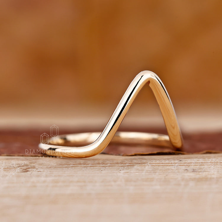Custom wedding band with a chevron silhouette