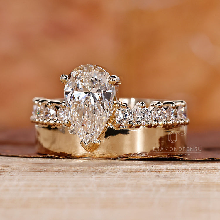 Round Diamond Ring with elegant pave setting and design.