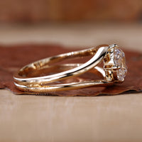 Old European cushion cut diamond ring with intricate detailing.