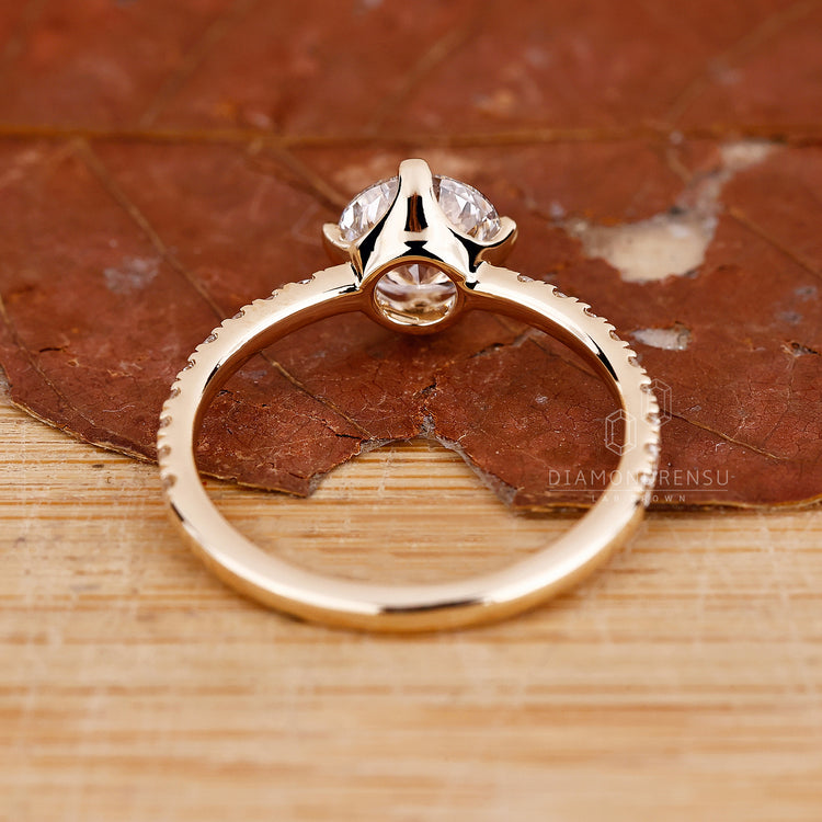 Prong Setting ring featuring a classic design and secure diamond placement.