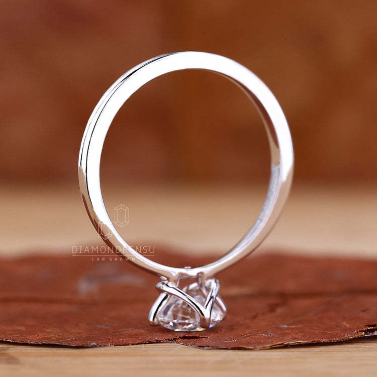 Buy engagement ring featuring a lab grown diamond for sustainability.