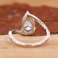 Round Diamond Ring set in a timeless and secure setting.