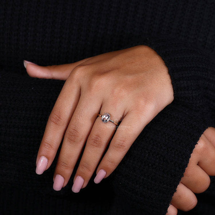 Yellow Gold Ring designed to enhance the beauty of the oval cut.