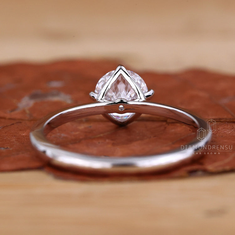 Handmade ring with a stunning round solitaire diamond for engagement.