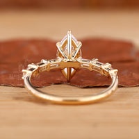 6 prong engagement ring with a brilliant marquise centre stone.