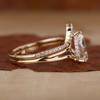 Brilliant Diamonds featured in a classic pear shaped ring.