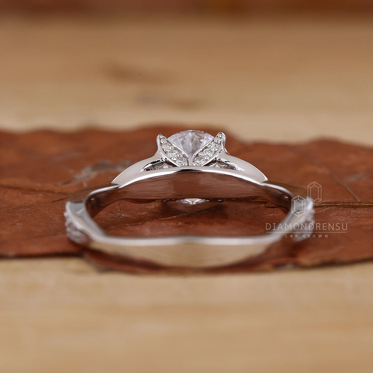 Beautiful handmade ring by Diamondrensu, showcasing a nature-inspired round diamond engagement ring