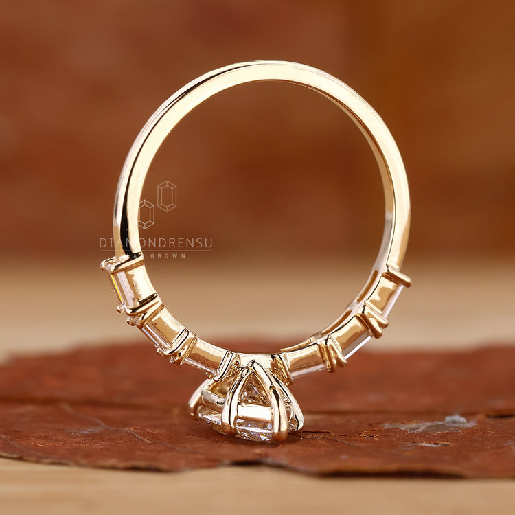 Lab grown diamond marquise ring set in a stunning gold band.