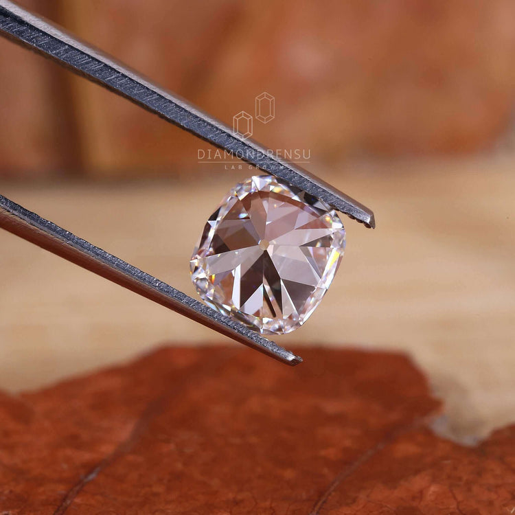 Loose lab grown diamond featuring a 1.17 carat old mine cushion cut style.