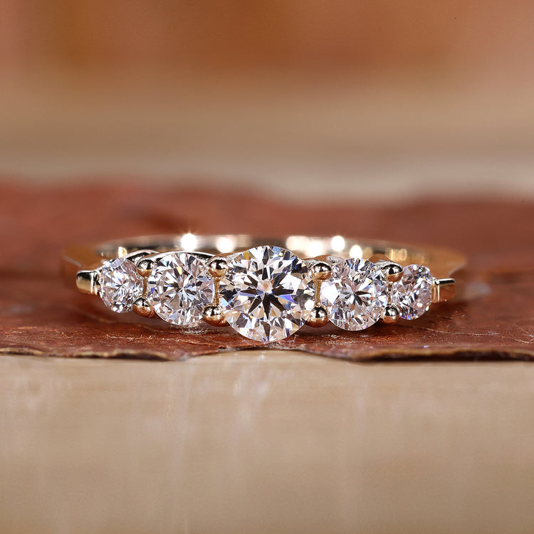 5 stone wedding band with a classic design.