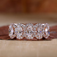 5 stone diamond ring featuring a classic prong setting.