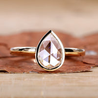 Pear Solitaire Engagement Ring crafted with elegance.