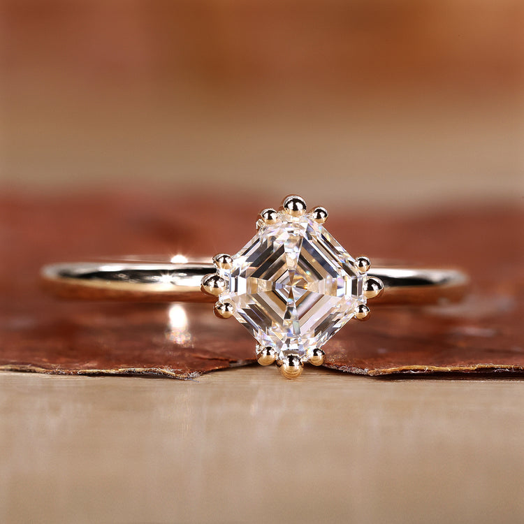Asscher cut diamond ring with a timeless design for elegance.