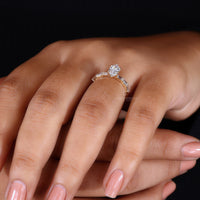 Round diamond pave band surrounding a luxurious marquise diamond.