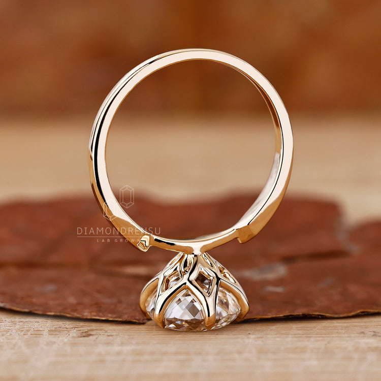 Claw Prongs securing a stunning diamond in place.